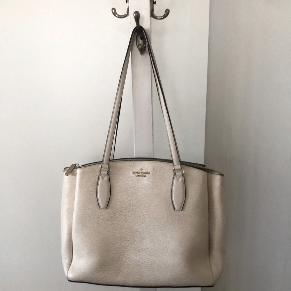 Kate Spade cream bag 3 separate compartments, this bag goes with everything!